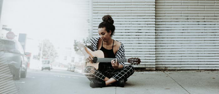 Taylor Taylor Sitting On Sidewalk